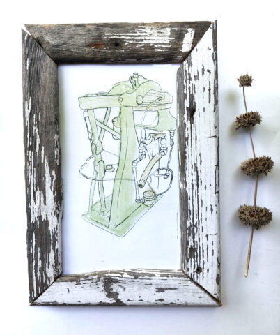 monotype etching shows old fashioned dry cleaner machine in lines with light green tint. Framed with rustic wood.
